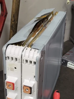 Kreativ revisjon av varmtvannsbereder - Åsane Autoservice.